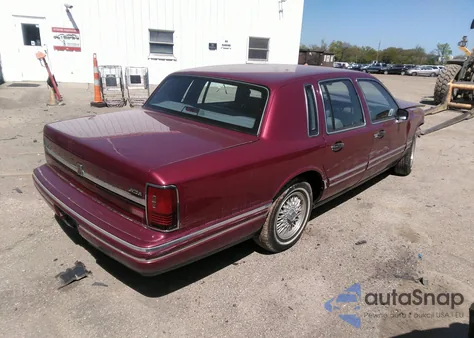 1993 Lincoln Town Car Executive z USA, uszkodzony, nr VIN 1LNLM81W7PY727890